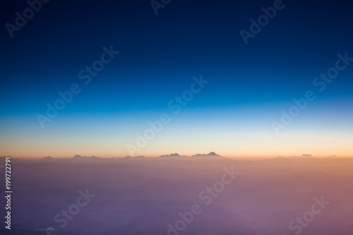 Flying over Caucasus mountains © Maygutyak