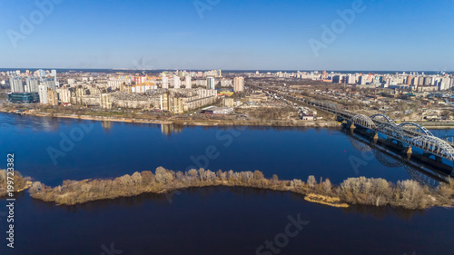 Aerial view of the Kiev city, Ukraine. Dnieper river with bridges. Darnitskiy bridge photo