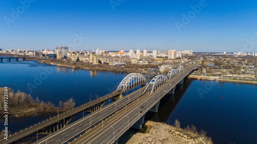 Aerial view of the Kiev city, Ukraine. Dnieper river with bridges. Darnitskiy bridge