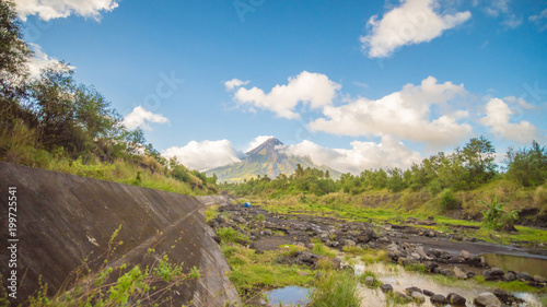 Mayon Volcano in Legazpi, Philippines. Mayon Volcano is an active volcano and rising 2462 meters from the shores of the Gulf of Albay. photo