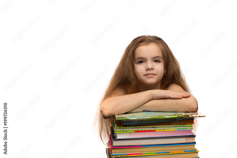 Cute caucasian little girl with books. School portrait. Isolated on white background Cute caucasian little girl with books. School portrait. Isolated on white background