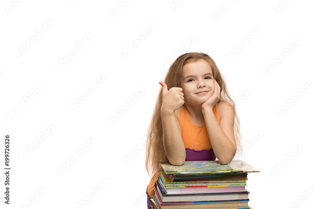 Cute caucasian little girl with books. School portrait. Isolated on white background Cute caucasian little girl with books. School portrait. Isolated on white background