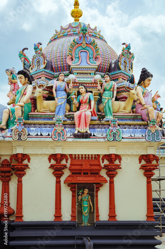 The Sri Mariamman Hindu Temple in Chinatown, Singapore. Fragment of decoration with painted figures of Hindu gods and deities.