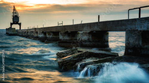 Wallpaper Mural stormy sea with a crane in the background Torontodigital.ca