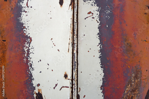 abstract partial view of weathered car paint photo