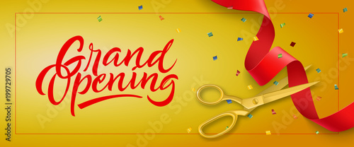 Grand opening festive banner design with frame, confetti and gold scissors cutting red ribbon on yellow background. Lettering can be used for invitations, signs, announcements