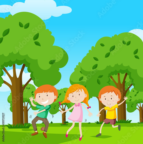 Three kids dancing in the garden