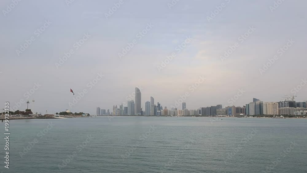 Abu Dhabi skyline in a cloudy day. Establishing shot. Abu Dhabi skyline in a cloudy day. Establishing shot.