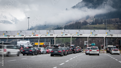 Traffic jam on toll gates, people traveling for holidays
