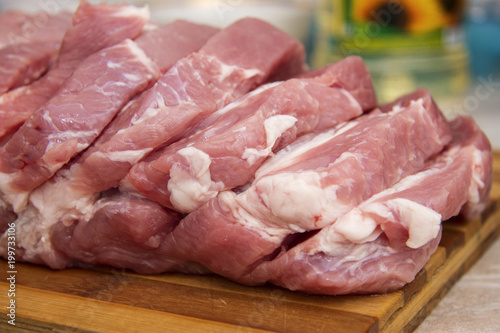 Pork meat slices prepared for cooking steak