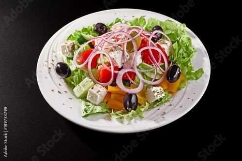 Closeup of Greek Salad on black background