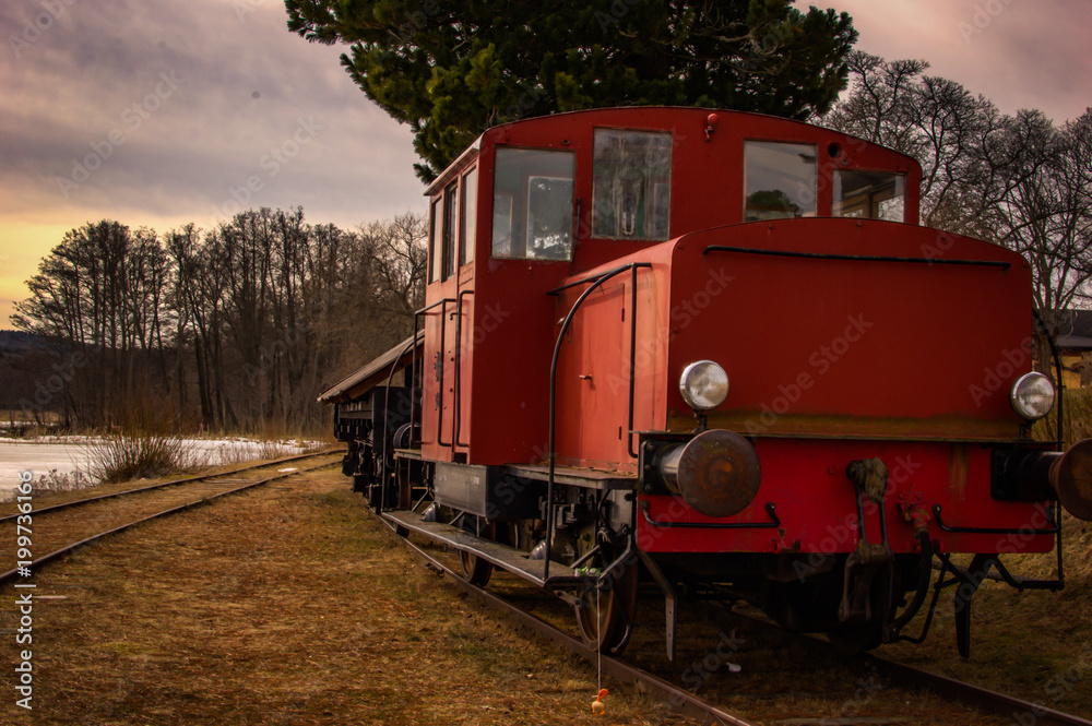 Fototapeta premium Vintage train by the lake