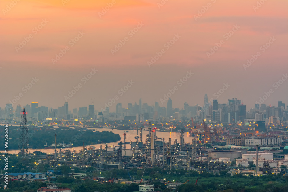 Oil refinery industry And Petrochemical plant with Twilight  time city view