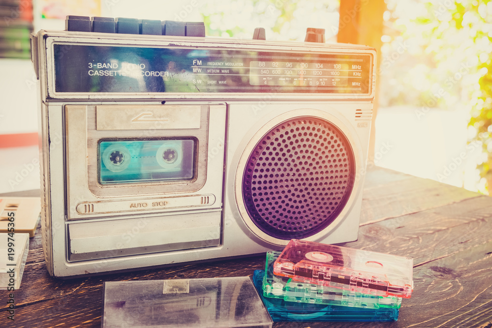 Retro lifestyle - tape cassette with cassette player and recorder for  listen music - vintage color tone effect. Photos | Adobe Stock