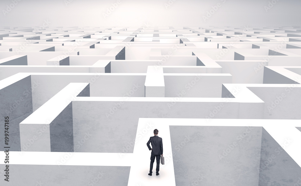 Small businessman in a middle of a huge maze
Small businessman in a middle of a huge maze