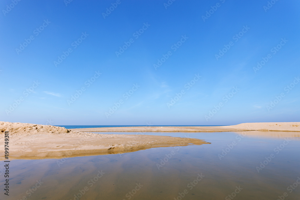 Beautiful tropical sea with white sand on the beach and clear blue sky at phuket thailand image for summer season and travel background. Beautiful tropical sea with white sand on the beach and clear blue sky at phuket thailand image for summer season and travel background.