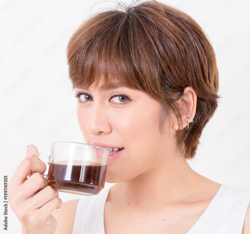 Beautifulyoung Asia woman with a cup of hot coffee. Isolated on white background. Studio lighting. Concept for healthy. Beautifulyoung Asia woman with a cup of hot coffee. Isolated on white background. Studio lighting. Concept for healthy.