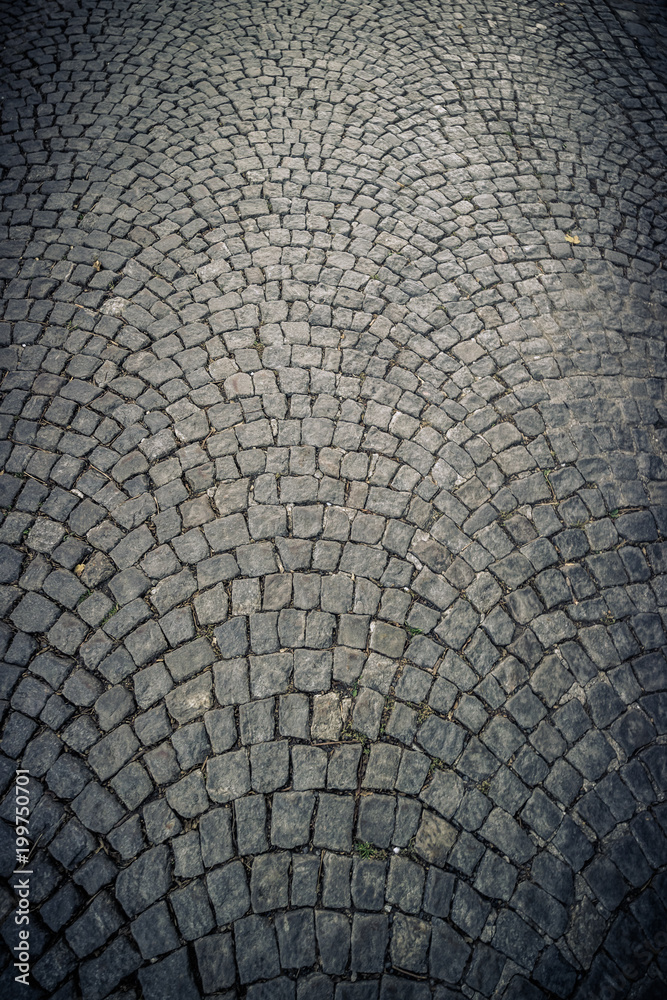 Texture of cobble stone pavement tiles