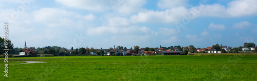 Bright green meadows and blue sky