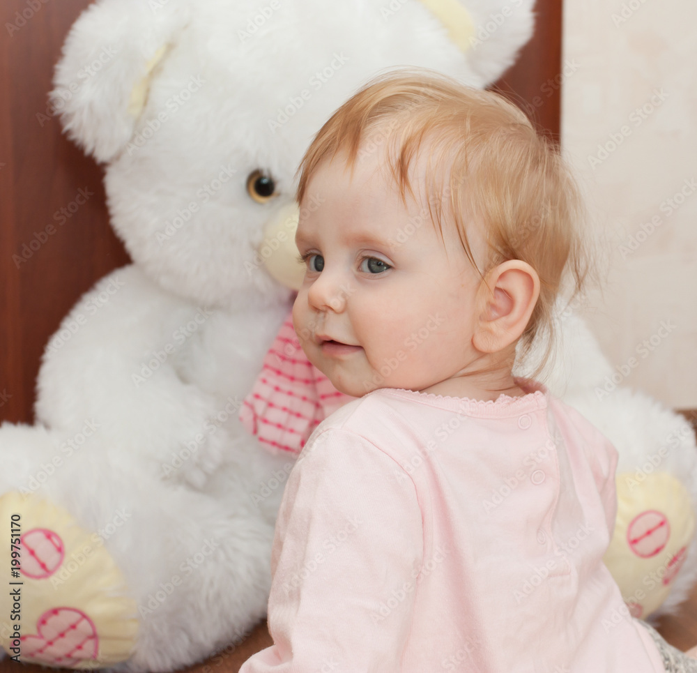 Portrait of a beautiful blonde child with toys Portrait of a beautiful blonde child with toys