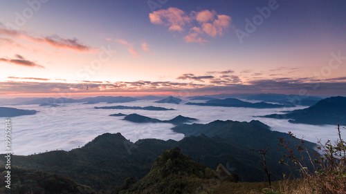 Beautiful Sunrise of travel place with morning mist at Phu chi dao/Phu chee dao in Chiangrai,Thailand