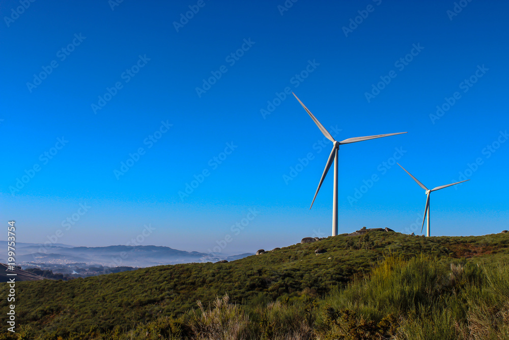windmills in the mountains of Portugal produce energy with the help of wind windmills in the mountains of Portugal produce energy with the help of wind