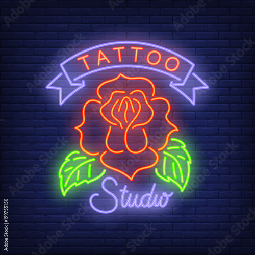 Tattoo studio neon sign with rose. Night bright advertisement, colorful signboard, light banner. Vector illustration in neon style.