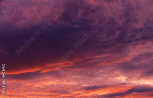 Dramatic sunset sky with evening sky clouds lit by bright sunlight © Leszek Kobusinski