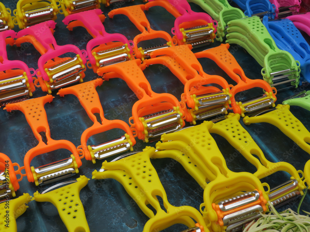 yellow, pink, green, blue and orange colored paring knifes