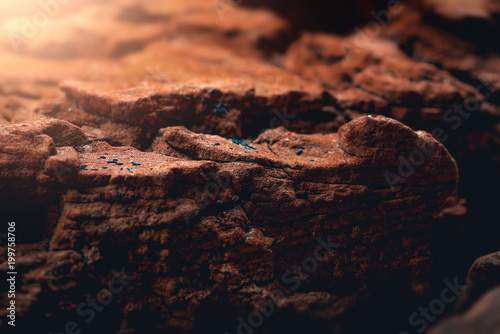 Sunset at the mars lightened the rocky surface of the planet. 