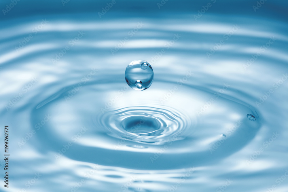 water surface with splash and waves made by droplet water surface with splash and waves made by droplet