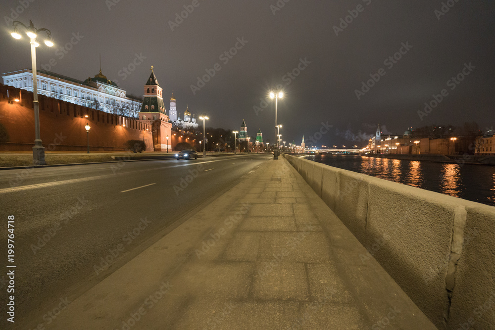 Obraz premium Night Moscow image. Cloudy. Night lights of city do colorful the night in Moscow. Kremlin wall and Government House are very bright.