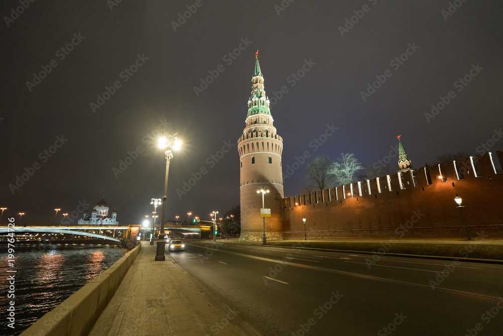 Night Moscow image. Cloudy. Night lights of city do colorful the night in Moscow. Kremlin wall, Spasskaya tower and Christ the Savior church are very bright.