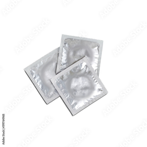 Three condoms isolated on white background. Close up