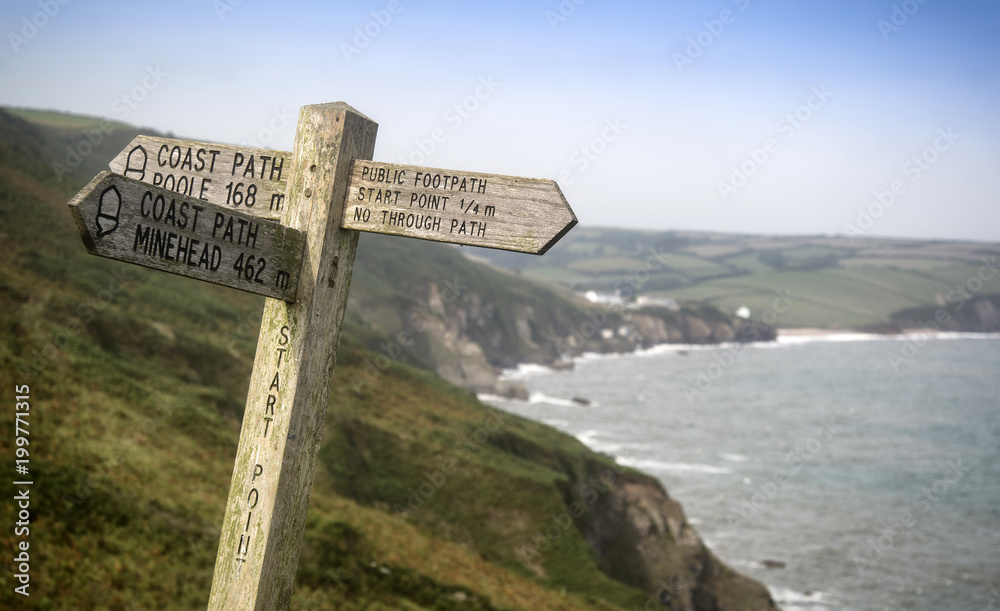 Public footpath waymarker signpost at Start Point in Cornwall England landscape Public footpath waymarker signpost at Start Point in Cornwall England landscape