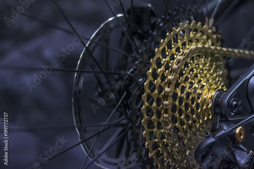 Gold bicycle cassette. Bicycle transmission, Rear wheel. 