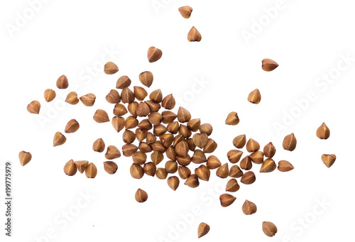 Close up of buckwheat grains isolated on white background. Top view photo