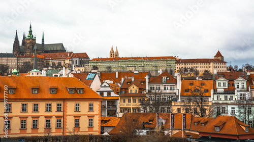 Prague / Czech - January 2 2018: Panorama of the city of Prague. The old part of the city. Beautiful roofs of shingles. Ancient buildings and churches.