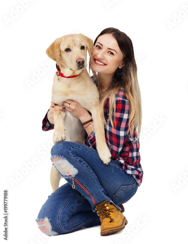 girl and dog labrador on white background