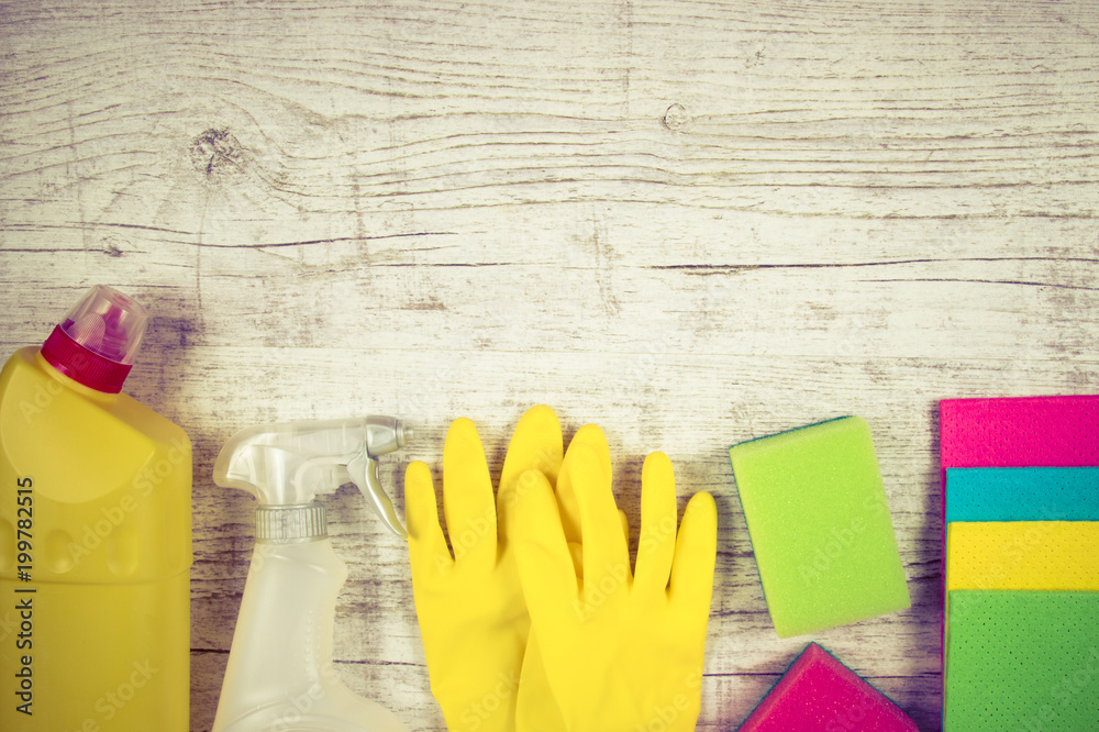 Set of cleaning up stuff on wooden background.