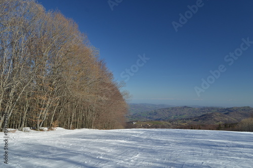 winter sports, skiing and snowboarding in italian mountain © neveemilia