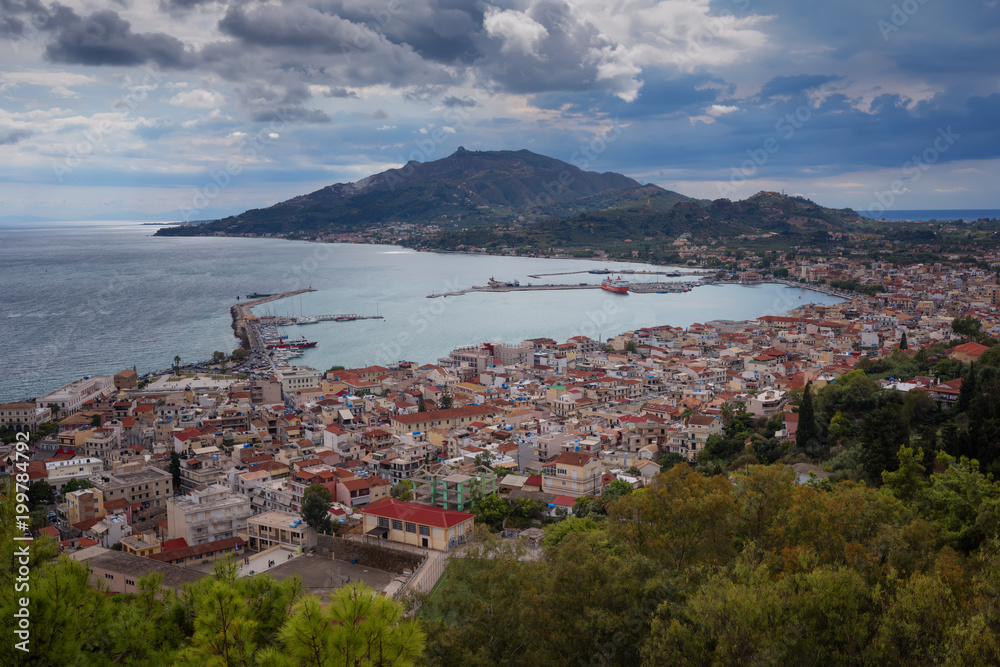 Fototapeta premium Aerial view of Zakynthos (Zante) town, Greece. Summer morning on the Ionian Sea. Beautiful cityscape panorama of Greece city. Traveling concept background. 