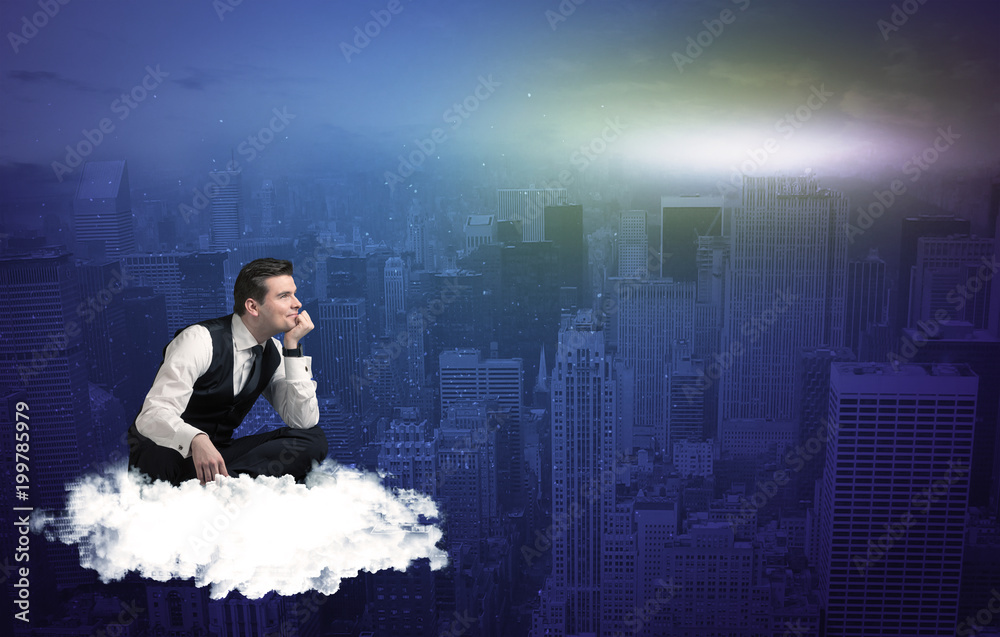Caucasian businessman sitting on a white fluffy cloud above the city, thinking and wondering Caucasian businessman sitting on a white fluffy cloud above the city, thinking and wondering
