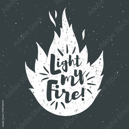 Vector flame with lettering and grunge texture. Light my fire. Burning bonfire silhouette with motivation quote and sparks. Illustration or background with space for your text.