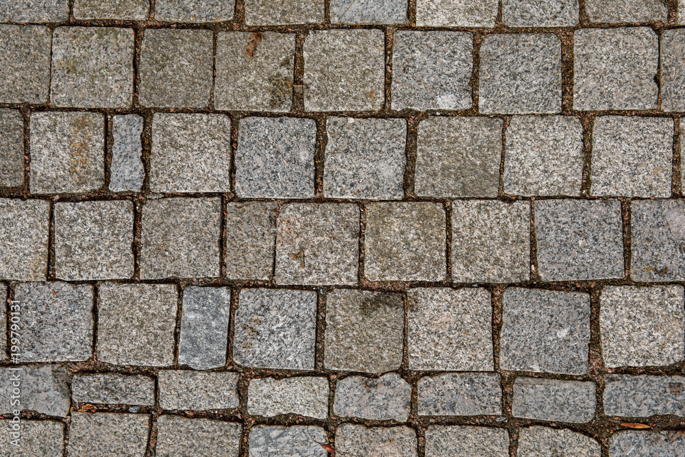 Granite cobble stone pavement background texture. Granite cobble stone pavement background texture.