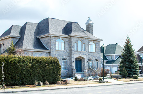 Photography Luxury house in Montreal, Canada against blue sky