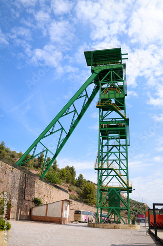 Green tower of a well extraction of a mine of salt. Cardona’s Salt Mountain Cultural Park. Cardona, Spain.