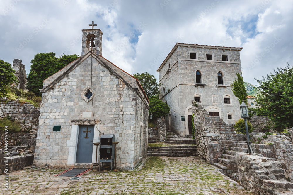 Stari Bar - ruined medieval city on Adriatic coast, Unesco World Heritage Site. Ancient stone serbian church with bell tower.