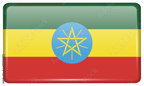 Flags Ethiopia in the form of a magnet on refrigerator with reflections light.