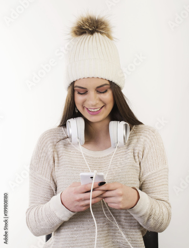 A young girl with headphones